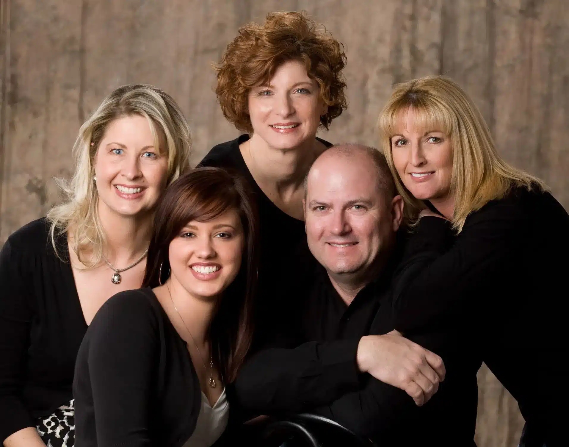 Group of smiling happy cosmetic dentistry patients