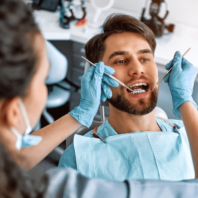 Man getting dental work done, representing cosmetic dentistry in chesapeake va