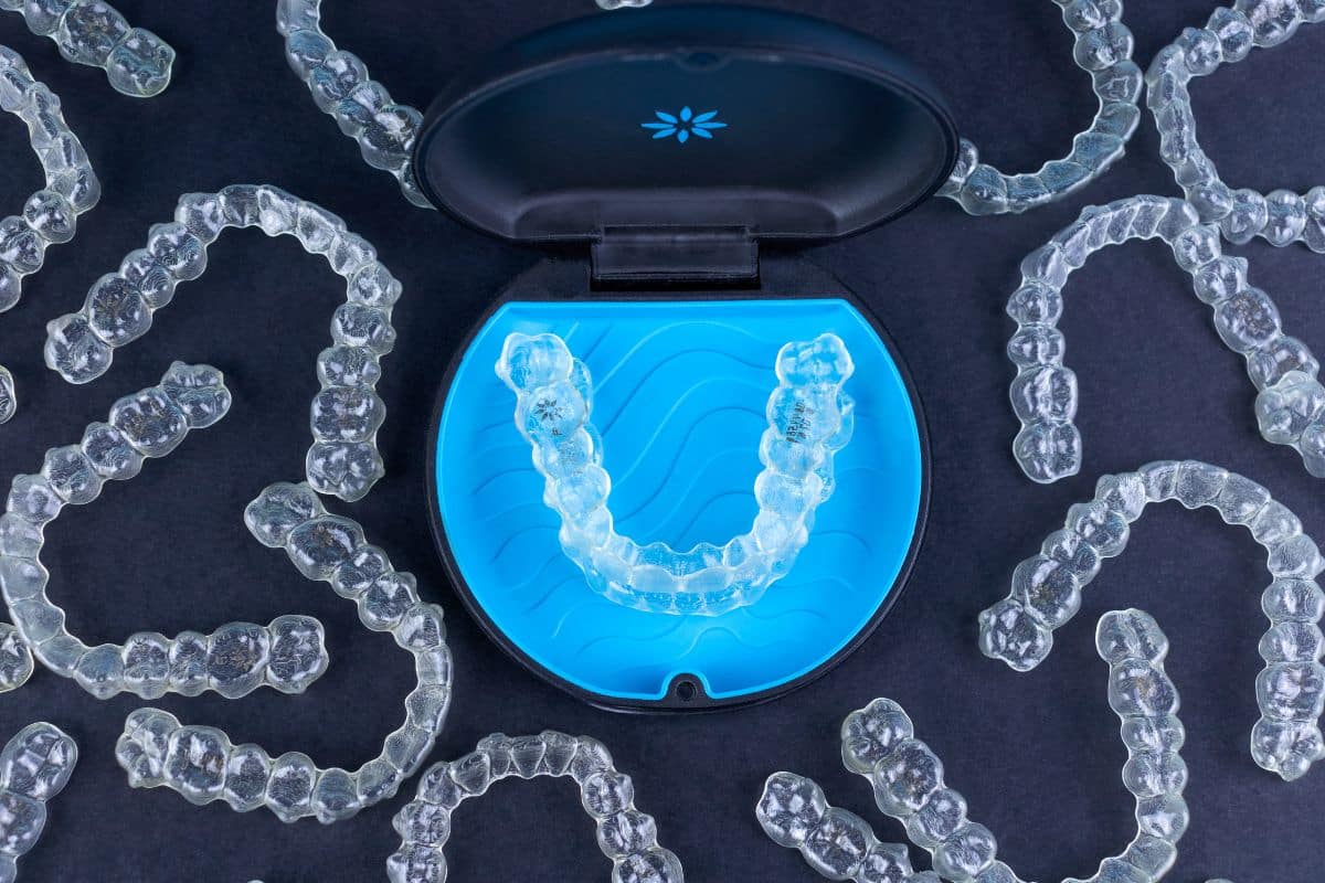 Young girl smiling after invisalign treatment at the center for cosmetic and restorative dentistry in chesapeake, va