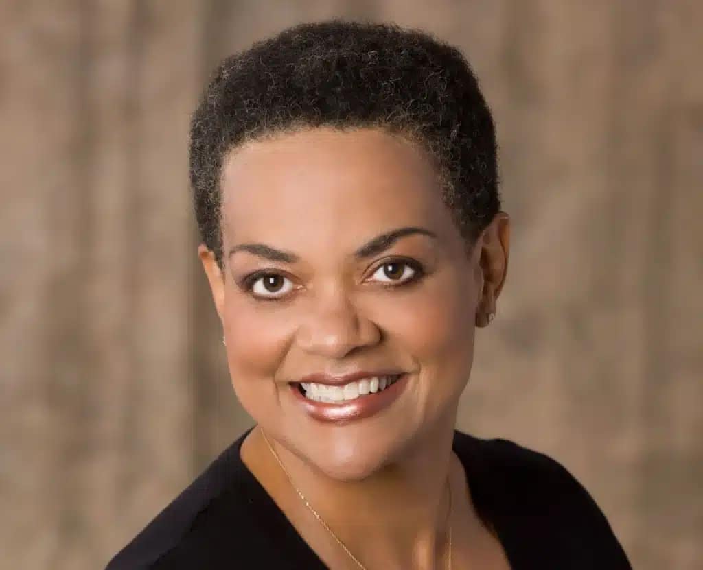 Confident woman smiling, representing prosthodontics and tmj specialist in chesapeake, va.