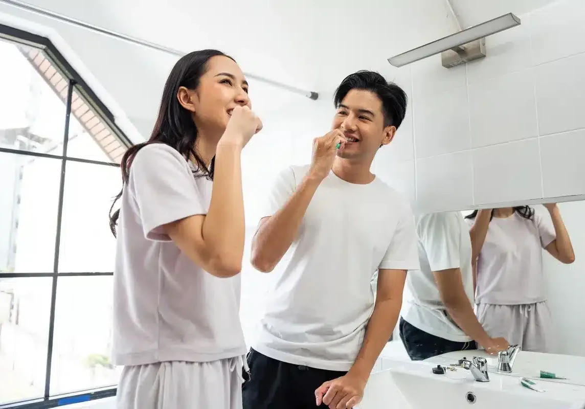 Couple managing good Dental Hygiene