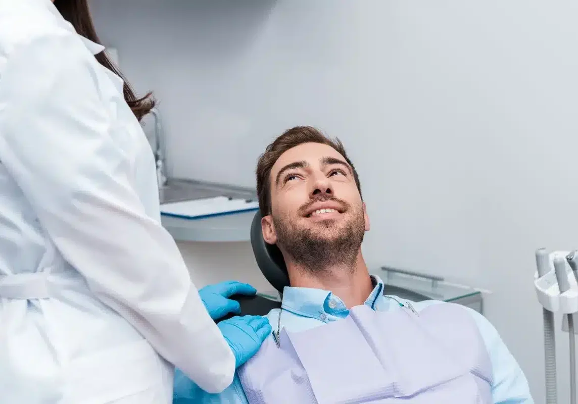 Guy getting dental exam